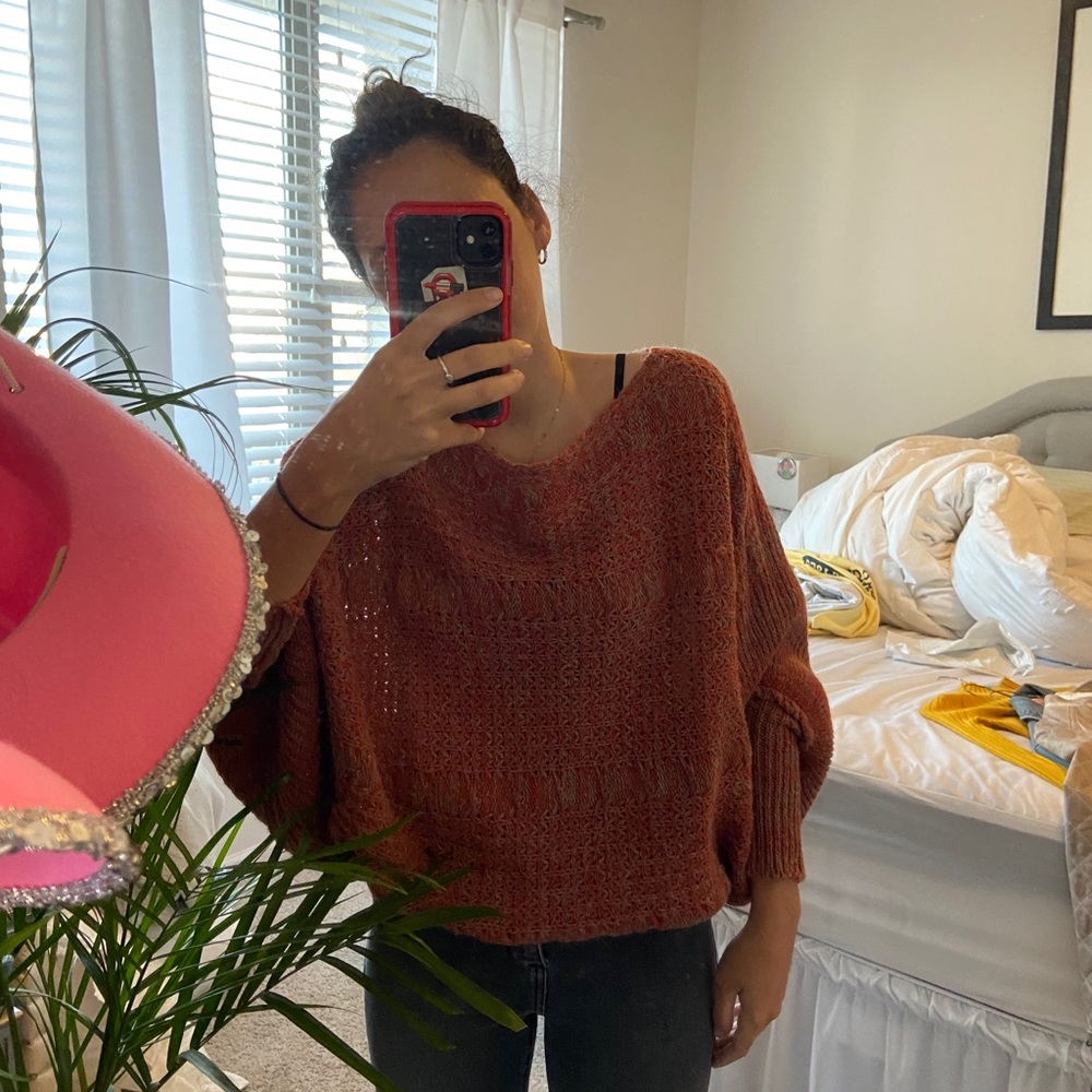 Orange/ red sweater!